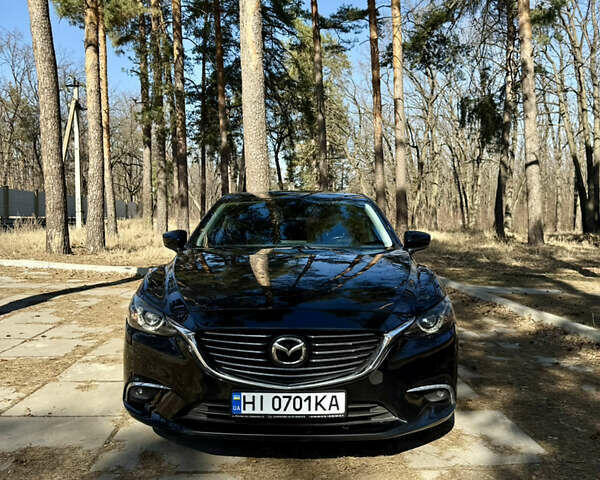 Черный Мазда 6, объемом двигателя 2.49 л и пробегом 124 тыс. км за 14700 $, фото 1 на Automoto.ua