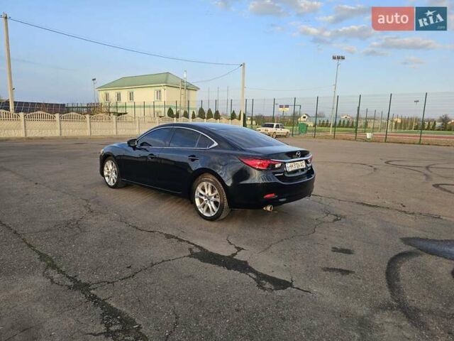 Черный Мазда 6, объемом двигателя 2.49 л и пробегом 178 тыс. км за 13600 $, фото 8 на Automoto.ua