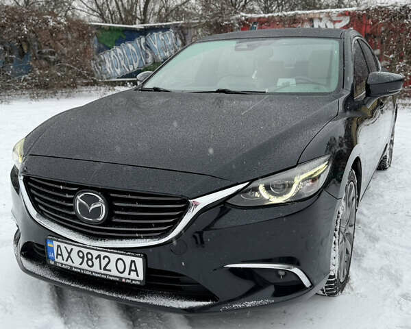 Черный Мазда 6, объемом двигателя 2.49 л и пробегом 155 тыс. км за 17000 $, фото 2 на Automoto.ua