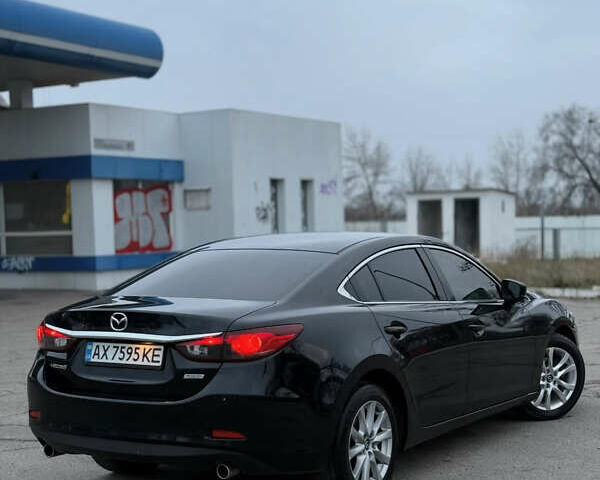 Черный Мазда 6, объемом двигателя 2.49 л и пробегом 148 тыс. км за 11000 $, фото 2 на Automoto.ua