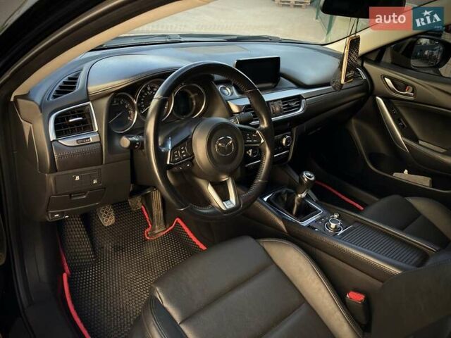 Черный Мазда 6, объемом двигателя 2.5 л и пробегом 77 тыс. км за 13100 $, фото 10 на Automoto.ua