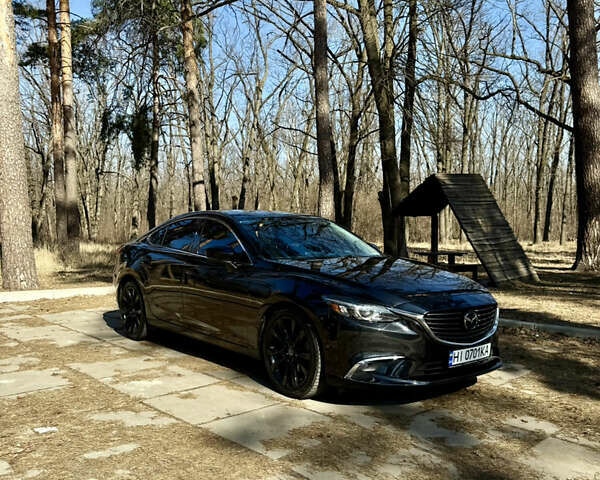Черный Мазда 6, объемом двигателя 2.49 л и пробегом 124 тыс. км за 14700 $, фото 5 на Automoto.ua