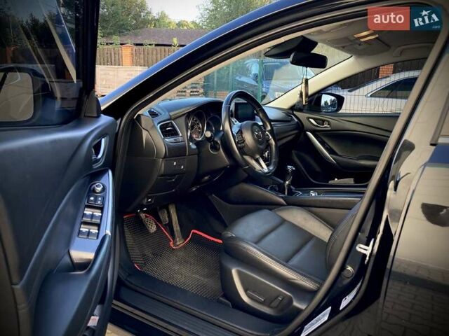 Черный Мазда 6, объемом двигателя 2.5 л и пробегом 77 тыс. км за 13100 $, фото 6 на Automoto.ua