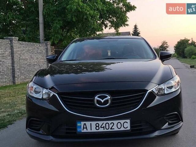 Черный Мазда 6, объемом двигателя 2.49 л и пробегом 141 тыс. км за 10700 $, фото 1 на Automoto.ua