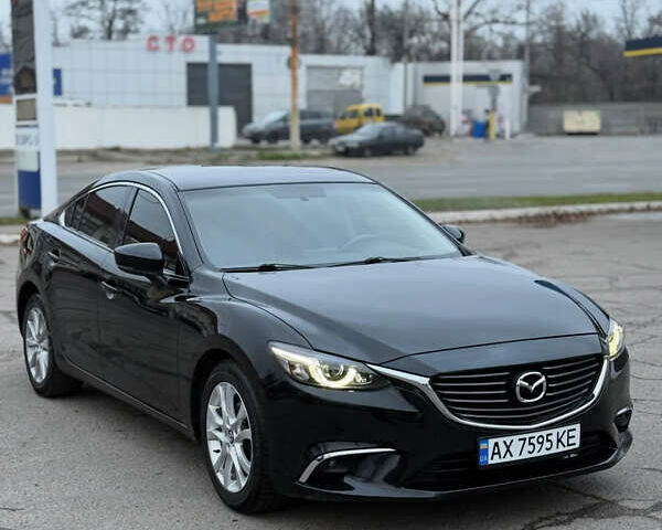 Черный Мазда 6, объемом двигателя 2.49 л и пробегом 148 тыс. км за 11000 $, фото 1 на Automoto.ua