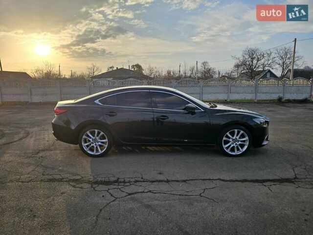 Черный Мазда 6, объемом двигателя 2.49 л и пробегом 178 тыс. км за 13600 $, фото 5 на Automoto.ua