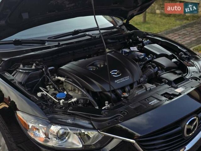 Черный Мазда 6, объемом двигателя 2.5 л и пробегом 70 тыс. км за 12800 $, фото 46 на Automoto.ua