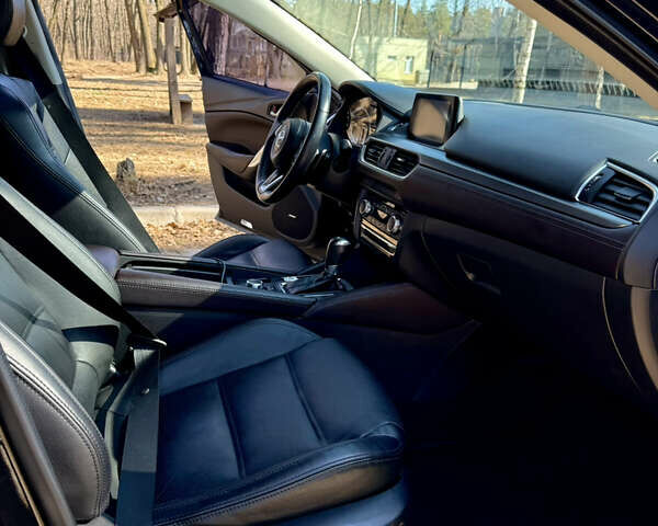 Черный Мазда 6, объемом двигателя 2.49 л и пробегом 124 тыс. км за 14700 $, фото 8 на Automoto.ua