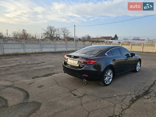 Черный Мазда 6, объемом двигателя 2.49 л и пробегом 178 тыс. км за 13600 $, фото 9 на Automoto.ua