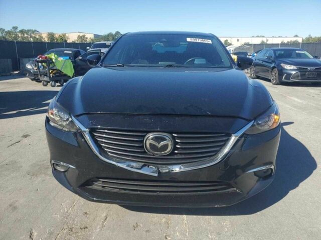 Черный Мазда 6, объемом двигателя 2.5 л и пробегом 120 тыс. км за 2000 $, фото 4 на Automoto.ua