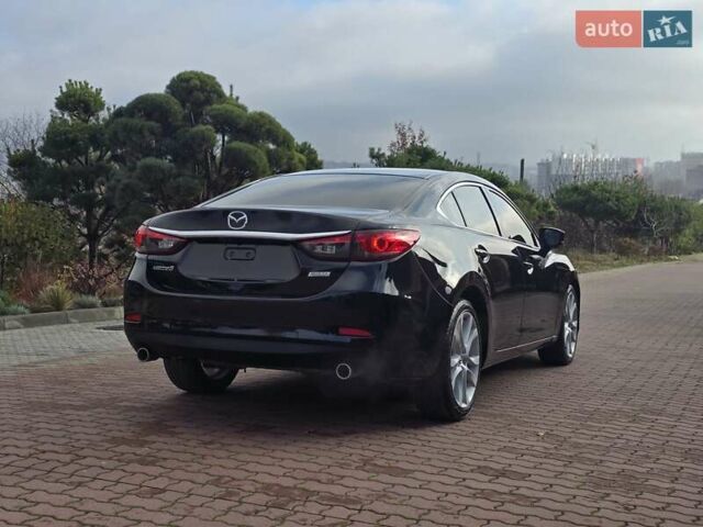 Черный Мазда 6, объемом двигателя 2.5 л и пробегом 70 тыс. км за 12800 $, фото 13 на Automoto.ua