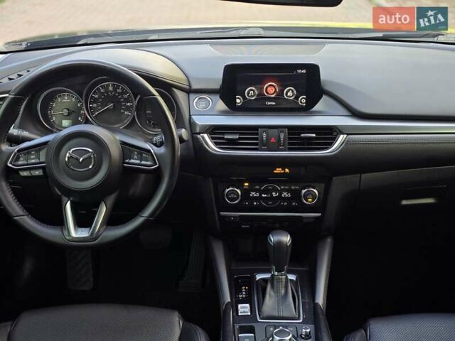 Черный Мазда 6, объемом двигателя 2.5 л и пробегом 70 тыс. км за 12800 $, фото 40 на Automoto.ua