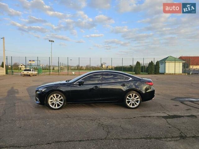 Черный Мазда 6, объемом двигателя 2.49 л и пробегом 178 тыс. км за 13600 $, фото 7 на Automoto.ua