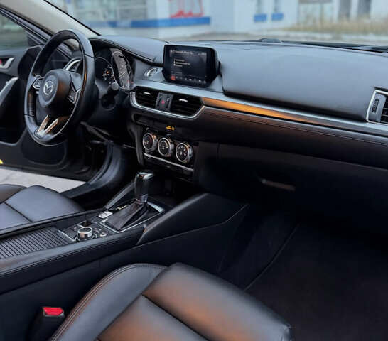 Черный Мазда 6, объемом двигателя 2.49 л и пробегом 148 тыс. км за 11000 $, фото 5 на Automoto.ua