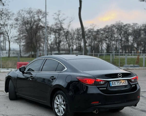 Черный Мазда 6, объемом двигателя 2.49 л и пробегом 148 тыс. км за 11000 $, фото 3 на Automoto.ua