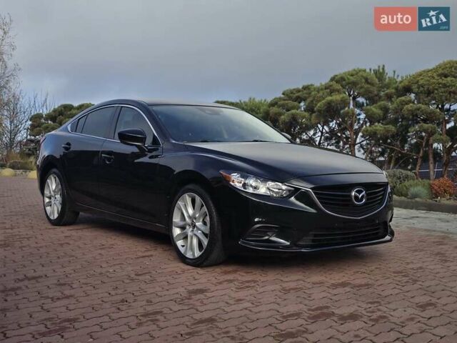 Черный Мазда 6, объемом двигателя 2.5 л и пробегом 70 тыс. км за 12800 $, фото 1 на Automoto.ua