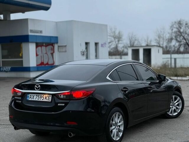 Черный Мазда 6, объемом двигателя 2.49 л и пробегом 158 тыс. км за 10100 $, фото 1 на Automoto.ua