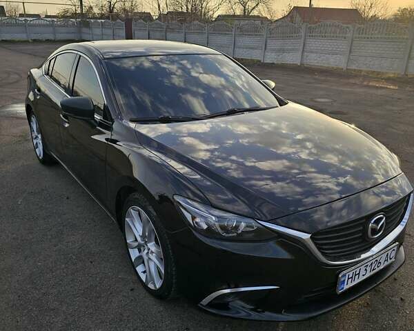 Черный Мазда 6, объемом двигателя 2.49 л и пробегом 178 тыс. км за 13600 $, фото 1 на Automoto.ua