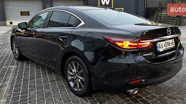 Черный Мазда 6, объемом двигателя 2.49 л и пробегом 71 тыс. км за 20000 $, фото 5 на Automoto.ua
