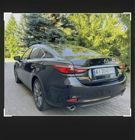 Черный Мазда 6, объемом двигателя 2.5 л и пробегом 100 тыс. км за 17499 $, фото 1 на Automoto.ua
