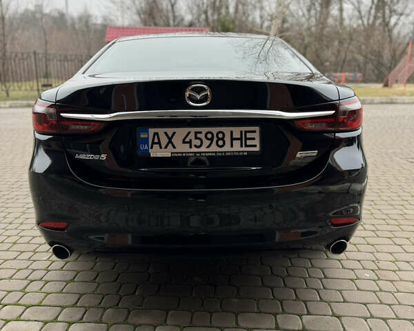 Черный Мазда 6, объемом двигателя 2.5 л и пробегом 70 тыс. км за 18900 $, фото 11 на Automoto.ua