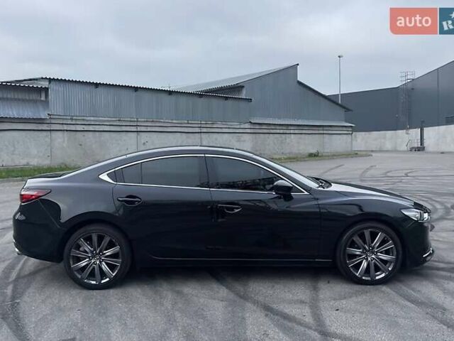 Черный Мазда 6, объемом двигателя 2.49 л и пробегом 66 тыс. км за 15600 $, фото 7 на Automoto.ua