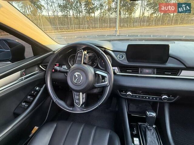 Черный Мазда 6, объемом двигателя 2.49 л и пробегом 128 тыс. км за 15800 $, фото 9 на Automoto.ua