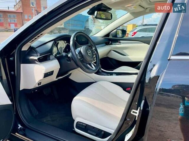 Черный Мазда 6, объемом двигателя 2.49 л и пробегом 141 тыс. км за 19550 $, фото 8 на Automoto.ua