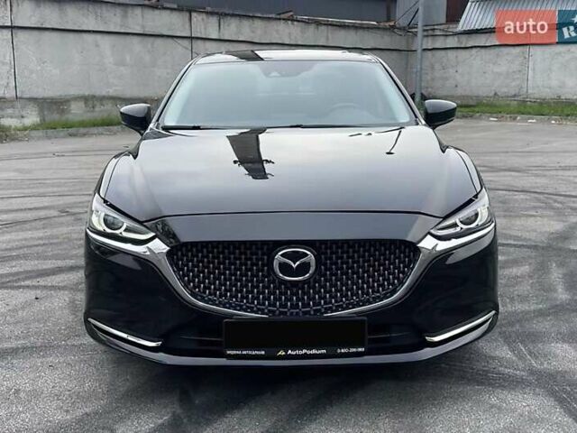 Черный Мазда 6, объемом двигателя 2.49 л и пробегом 66 тыс. км за 15600 $, фото 1 на Automoto.ua