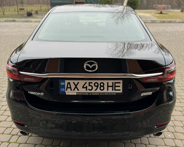 Черный Мазда 6, объемом двигателя 2.5 л и пробегом 70 тыс. км за 18900 $, фото 10 на Automoto.ua