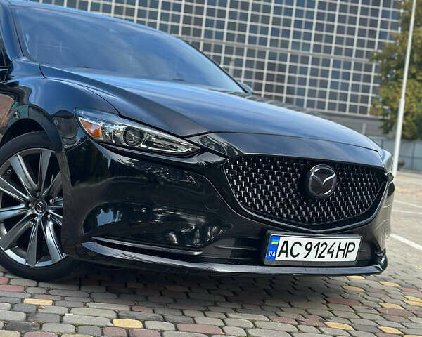 Черный Мазда 6, объемом двигателя 2.5 л и пробегом 139 тыс. км за 17900 $, фото 1 на Automoto.ua