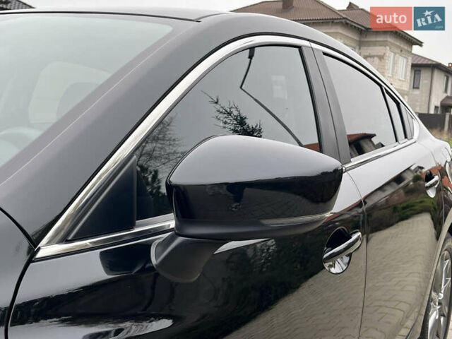 Черный Мазда 6, объемом двигателя 2 л и пробегом 92 тыс. км за 16950 $, фото 30 на Automoto.ua