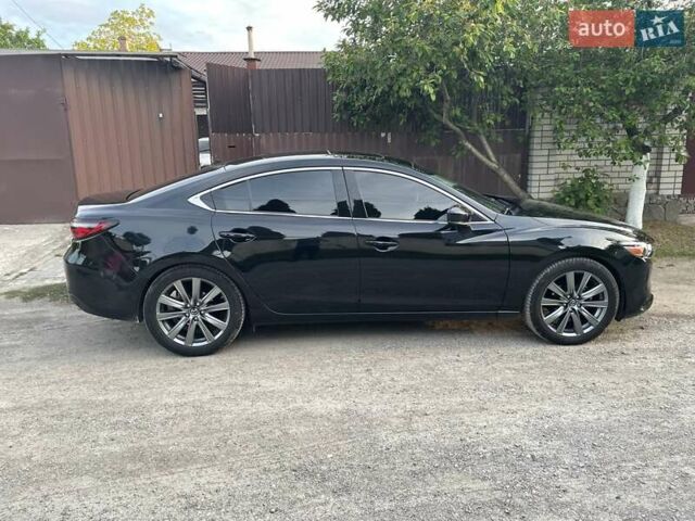 Чорний Мазда 6, об'ємом двигуна 2.49 л та пробігом 128 тис. км за 15999 $, фото 1 на Automoto.ua