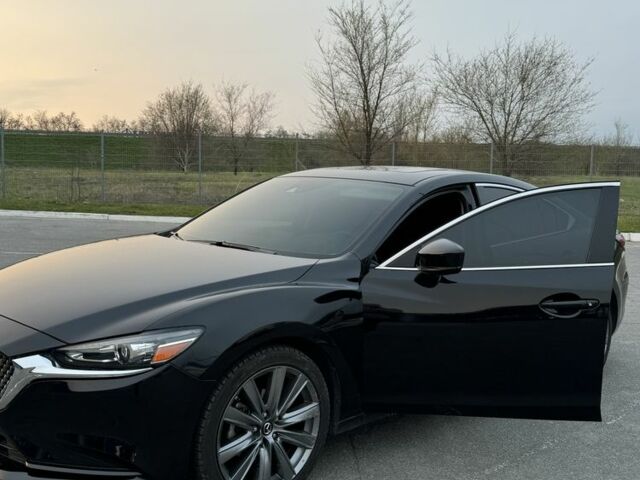 Черный Мазда 6, объемом двигателя 2.5 л и пробегом 128 тыс. км за 15300 $, фото 5 на Automoto.ua