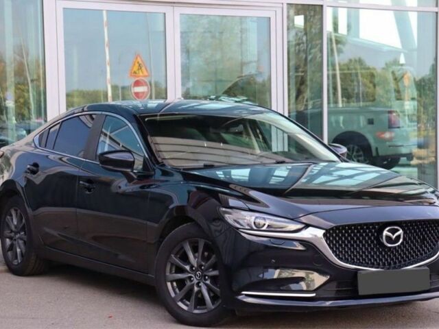 Черный Мазда 6, объемом двигателя 2 л и пробегом 86 тыс. км за 11200 $, фото 1 на Automoto.ua