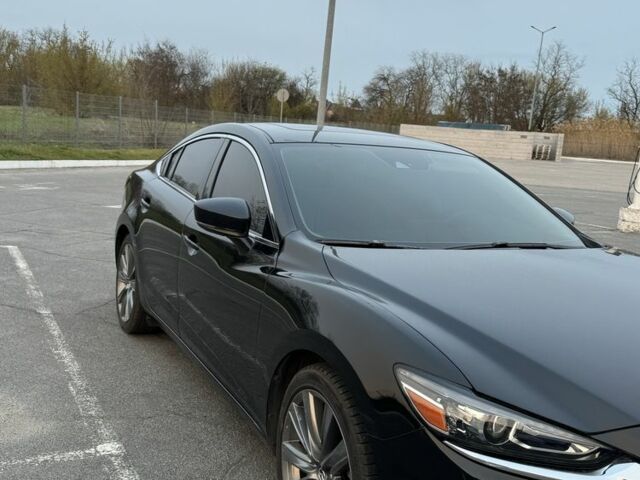 Черный Мазда 6, объемом двигателя 2.5 л и пробегом 128 тыс. км за 15300 $, фото 6 на Automoto.ua