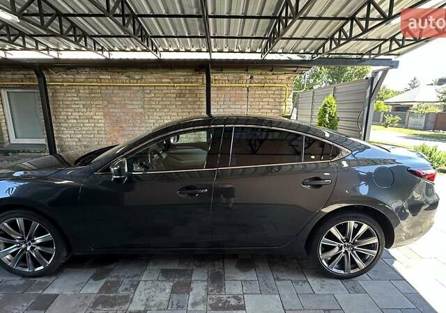 Черный Мазда 6, объемом двигателя 2.49 л и пробегом 125 тыс. км за 19400 $, фото 7 на Automoto.ua
