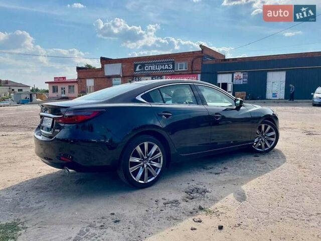 Черный Мазда 6, объемом двигателя 2.49 л и пробегом 141 тыс. км за 19550 $, фото 3 на Automoto.ua