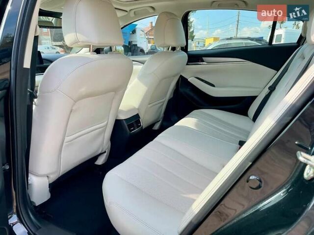 Черный Мазда 6, объемом двигателя 2.49 л и пробегом 141 тыс. км за 19550 $, фото 7 на Automoto.ua