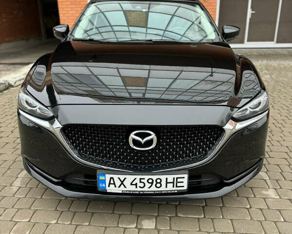 Черный Мазда 6, объемом двигателя 2.5 л и пробегом 70 тыс. км за 18900 $, фото 13 на Automoto.ua