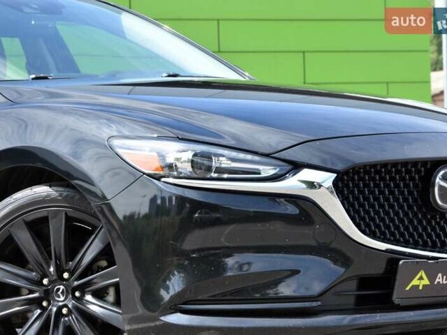 Черный Мазда 6, объемом двигателя 2.5 л и пробегом 121 тыс. км за 16500 $, фото 3 на Automoto.ua