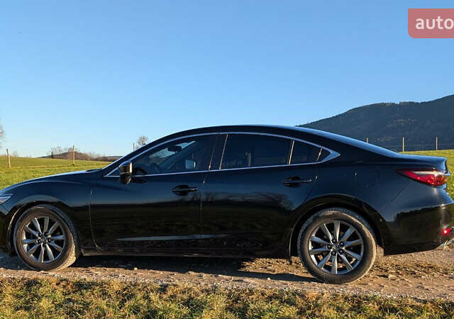 Черный Мазда 6, объемом двигателя 2.49 л и пробегом 111 тыс. км за 16500 $, фото 2 на Automoto.ua