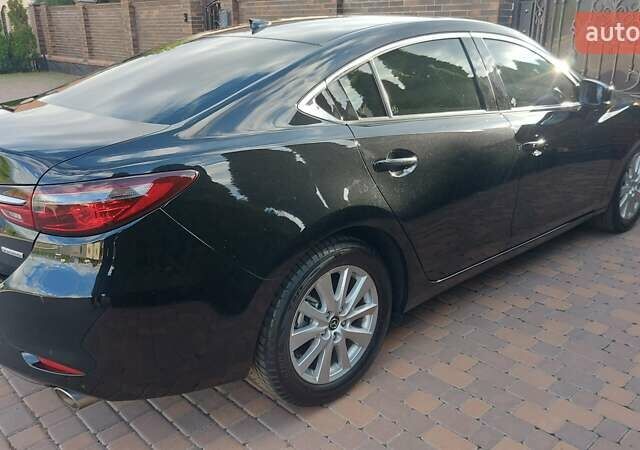 Чорний Мазда 6, об'ємом двигуна 2.49 л та пробігом 60 тис. км за 19900 $, фото 3 на Automoto.ua
