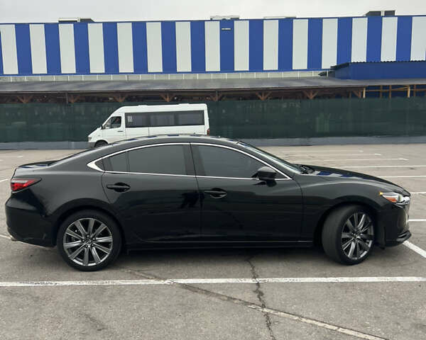 Черный Мазда 6, объемом двигателя 2.49 л и пробегом 172 тыс. км за 15500 $, фото 3 на Automoto.ua