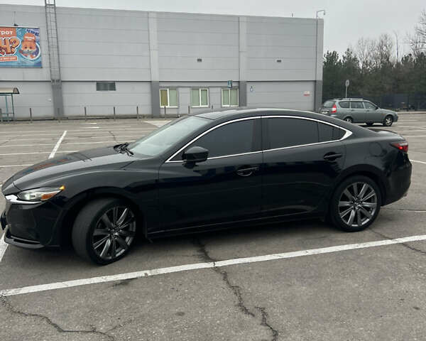 Черный Мазда 6, объемом двигателя 2.49 л и пробегом 172 тыс. км за 15500 $, фото 1 на Automoto.ua