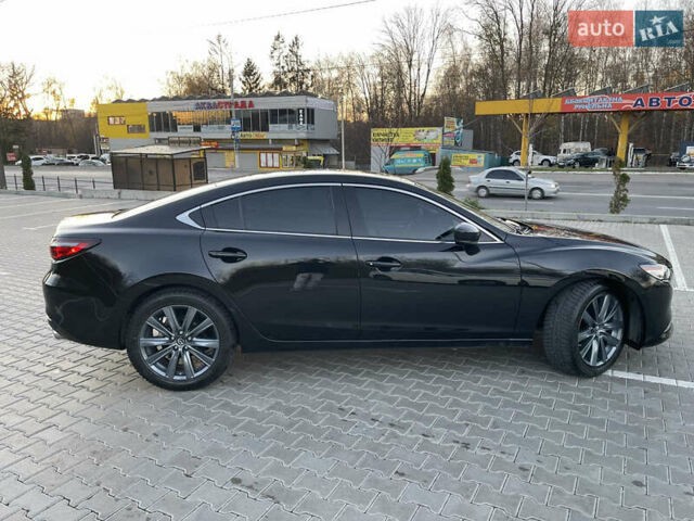 Черный Мазда 6, объемом двигателя 2.5 л и пробегом 125 тыс. км за 18050 $, фото 9 на Automoto.ua