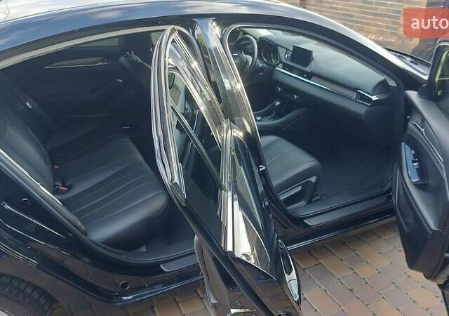 Чорний Мазда 6, об'ємом двигуна 2.49 л та пробігом 60 тис. км за 19900 $, фото 7 на Automoto.ua