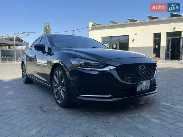 Черный Мазда 6, объемом двигателя 2.49 л и пробегом 146 тыс. км за 16999 $, фото 7 на Automoto.ua