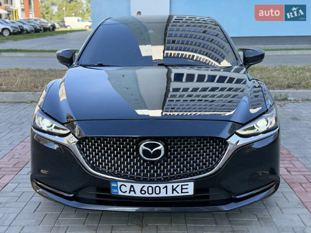 Черный Мазда 6, объемом двигателя 2.49 л и пробегом 98 тыс. км за 15000 $, фото 1 на Automoto.ua