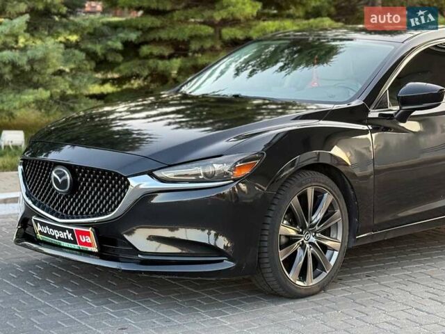 Чорний Мазда 6, об'ємом двигуна 2.5 л та пробігом 77 тис. км за 14940 $, фото 1 на Automoto.ua
